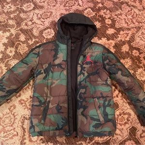 Gently used Nike Jordan boys winter jacket in camouflage.
